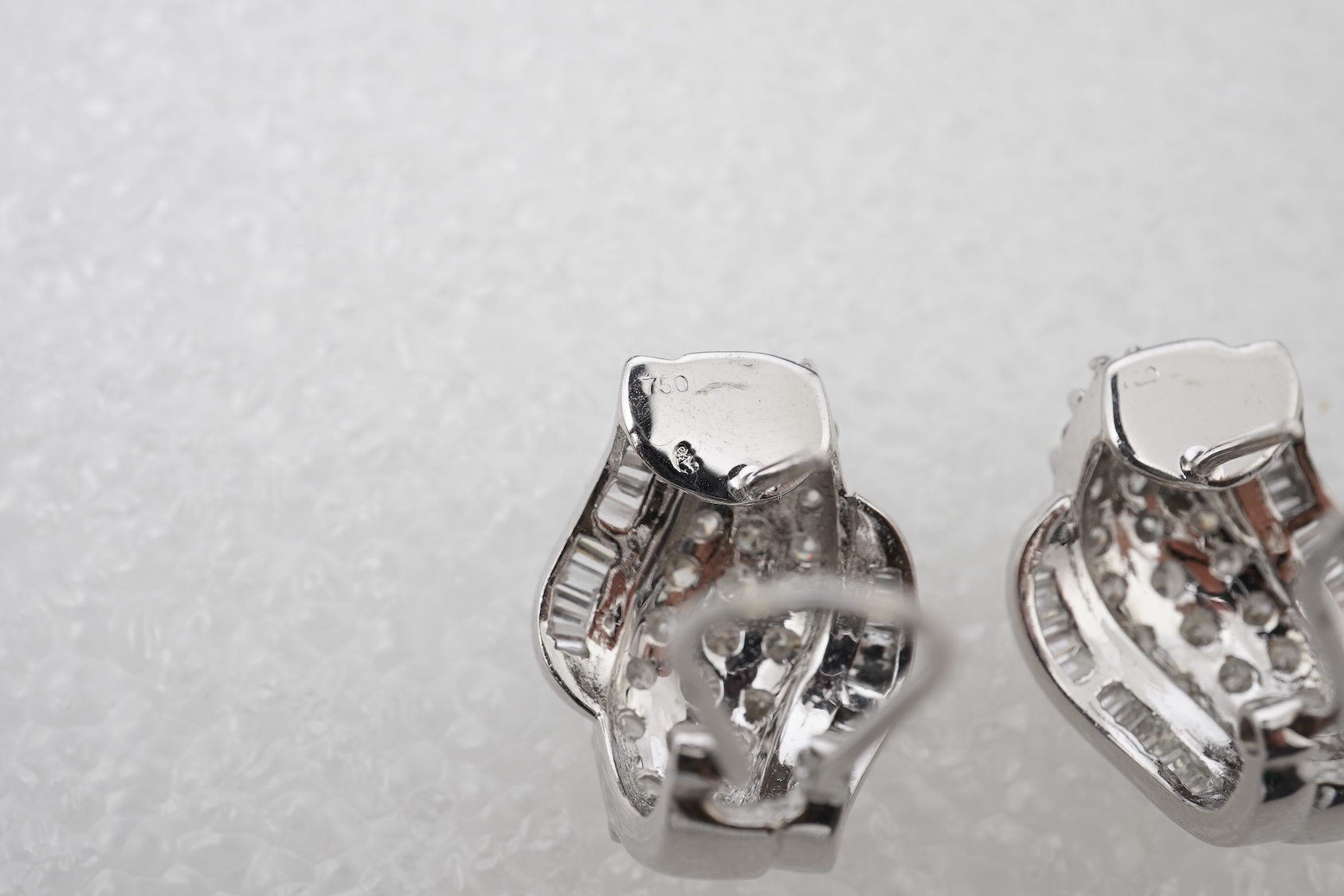 A pair of diamond earrings